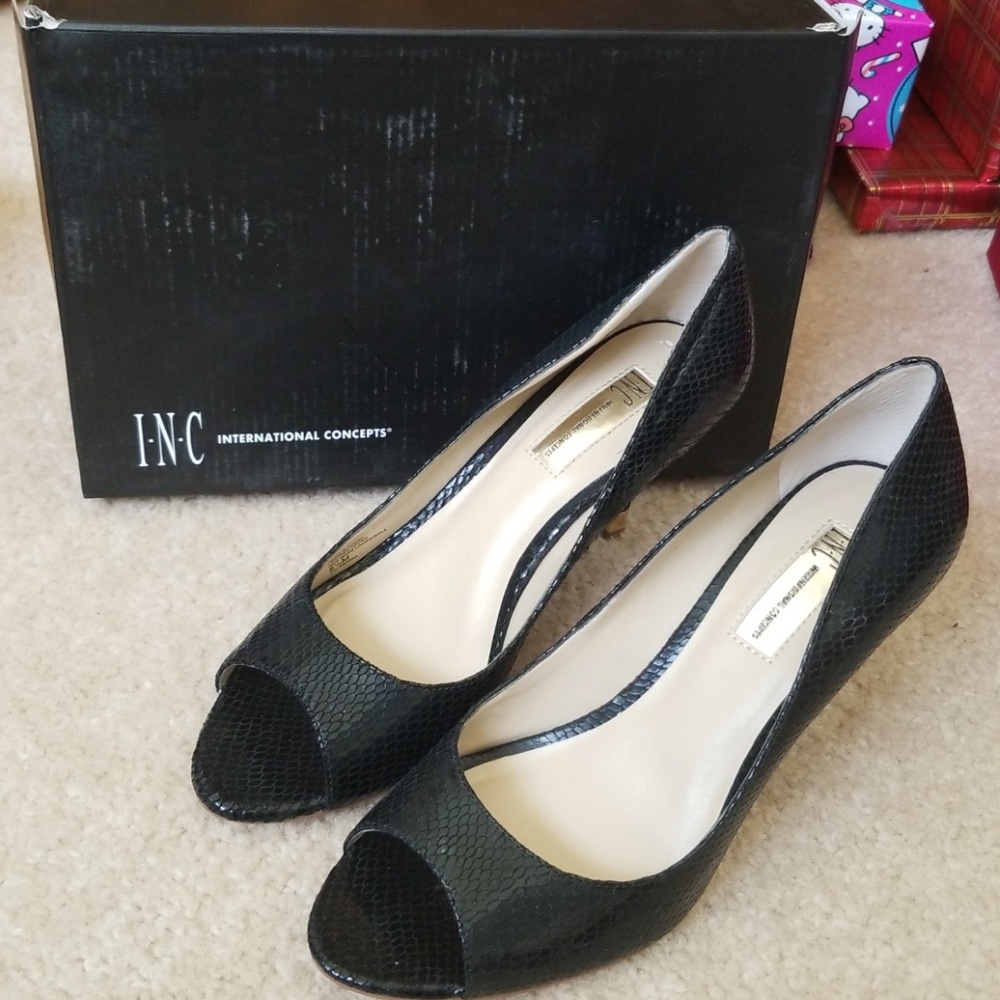Used INC black heels in size 8.5 M